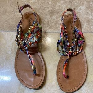 Pair of sandals Zigi soho NEVER WORN. Multi color size 8